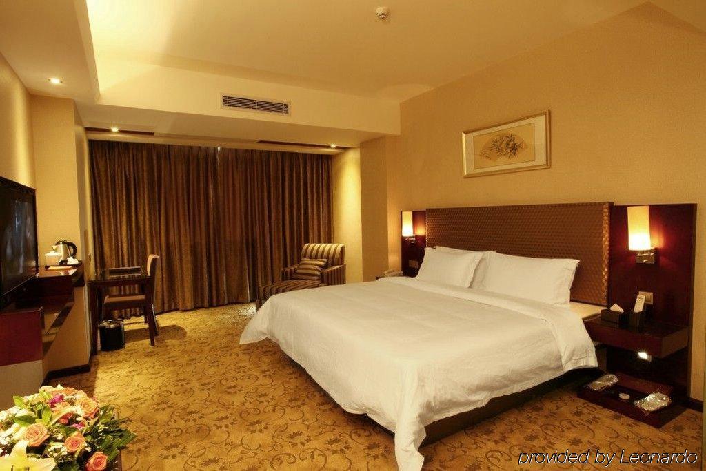 Oriental Shine Hotel Shenzhen Room photo